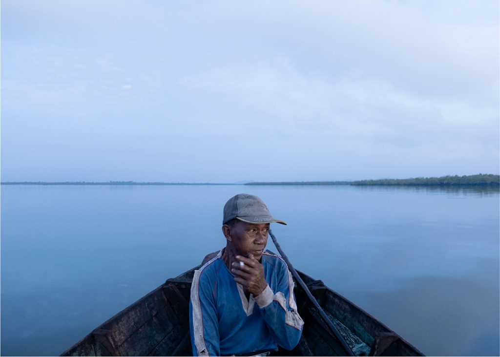 Badak, an Orang Laut leader in Tanjung Gundap, a coastal village in Indonesia's Riau Islands, once sailed as far as Singapore to catch fish and turtles before settling on land. Now he rarely goes to sea and earns a living collecting mangrove wood for charcoal.