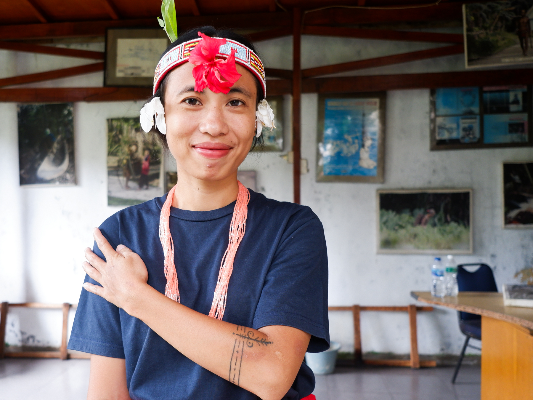 Yuhena Firah Tatubeket, 27, from Sipora, is proud of the traditional tattoo on her left arm. She is a teacher candidate in the Mentawai Mengajar 2025 program.