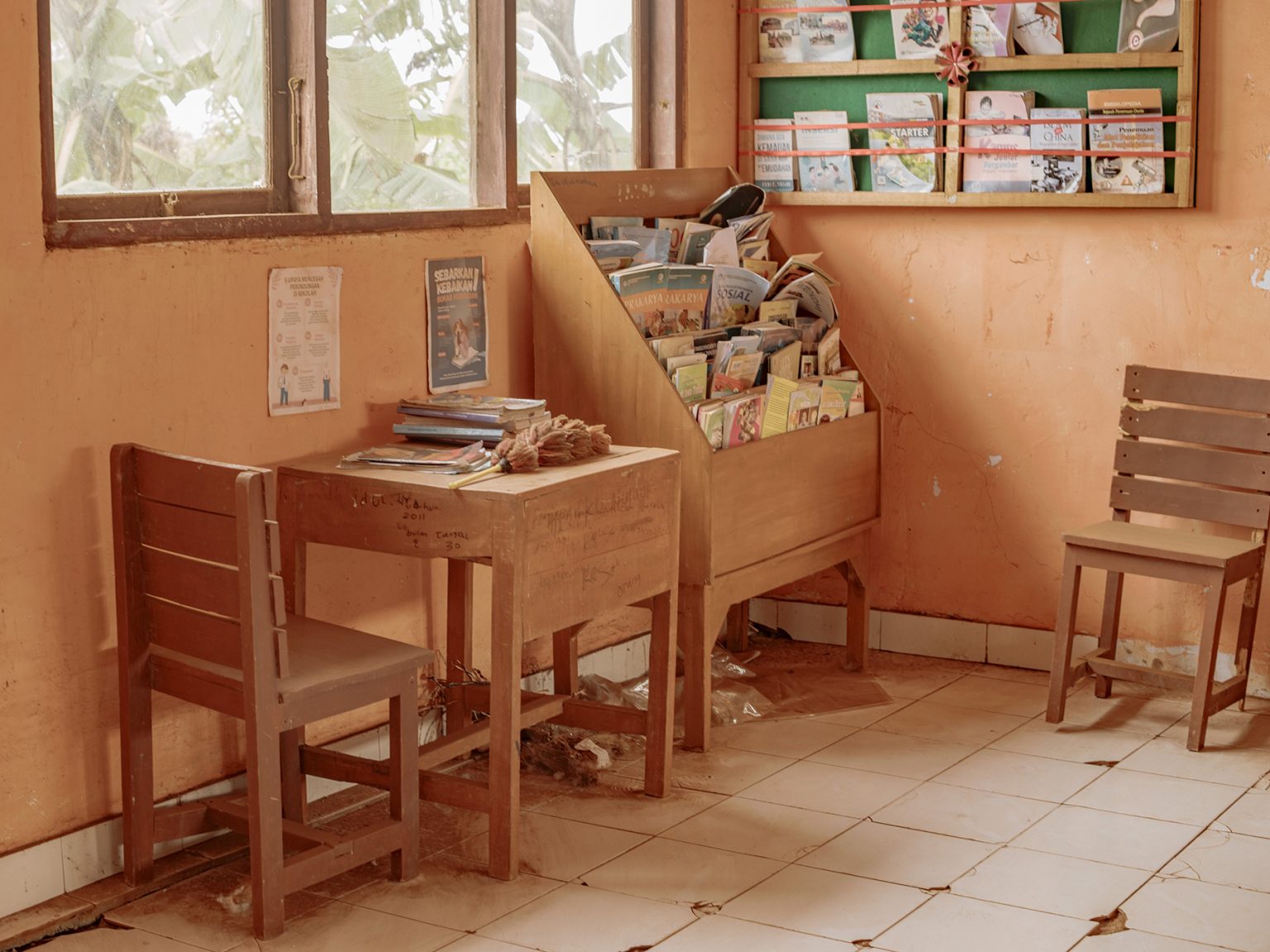 A corner of a classroom after it has been swept. Dust from PT Hengsheng New Energy Material Indonesia’s nickel smelters in Pa’jukukang district, Bantaeng, continues to drift into the rooms and is difficult to remove.