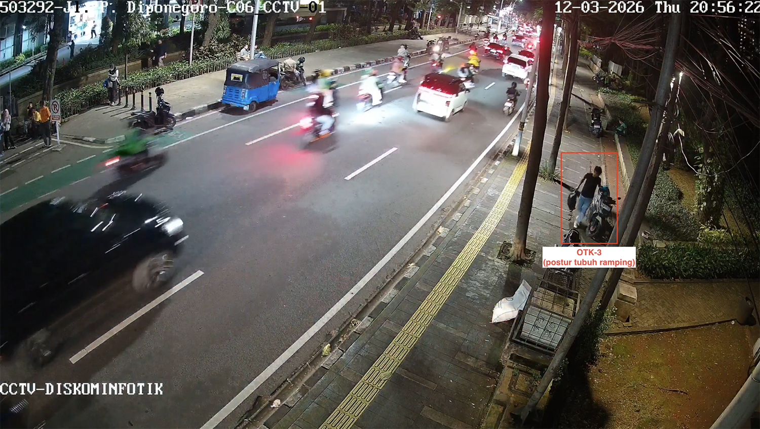 Suspect No. 3 appears slim and is seen carrying a large black backpack on the night of the attack.