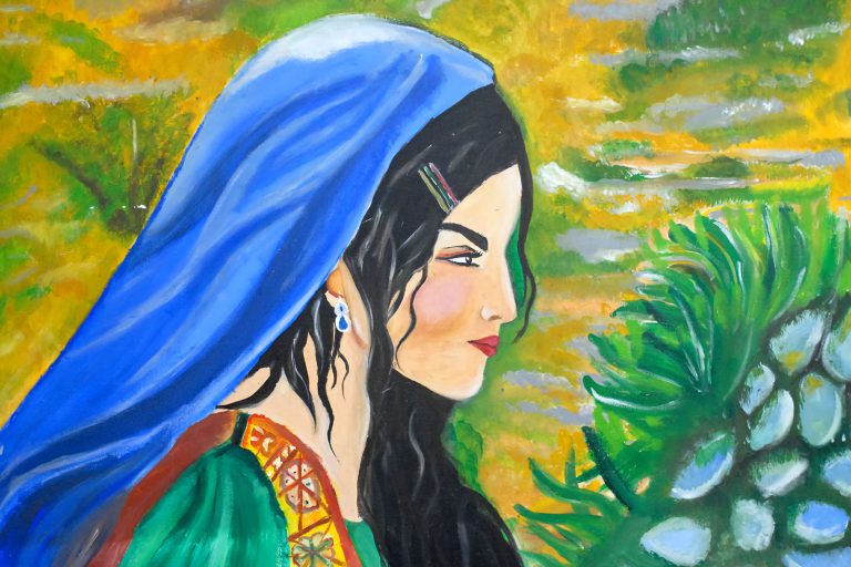A painting of a Hazara woman has been installed on a wall at Cisarua Refugee Learning Center (CRLC)—a refugee-led initiative established in 2014. (Project M/Rangga Firmansyah)